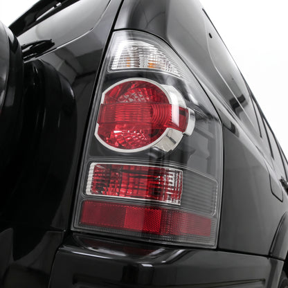 Mitsubishi Pajero NM / NP (2000 - 2006) Black Tail Lights LH + RH