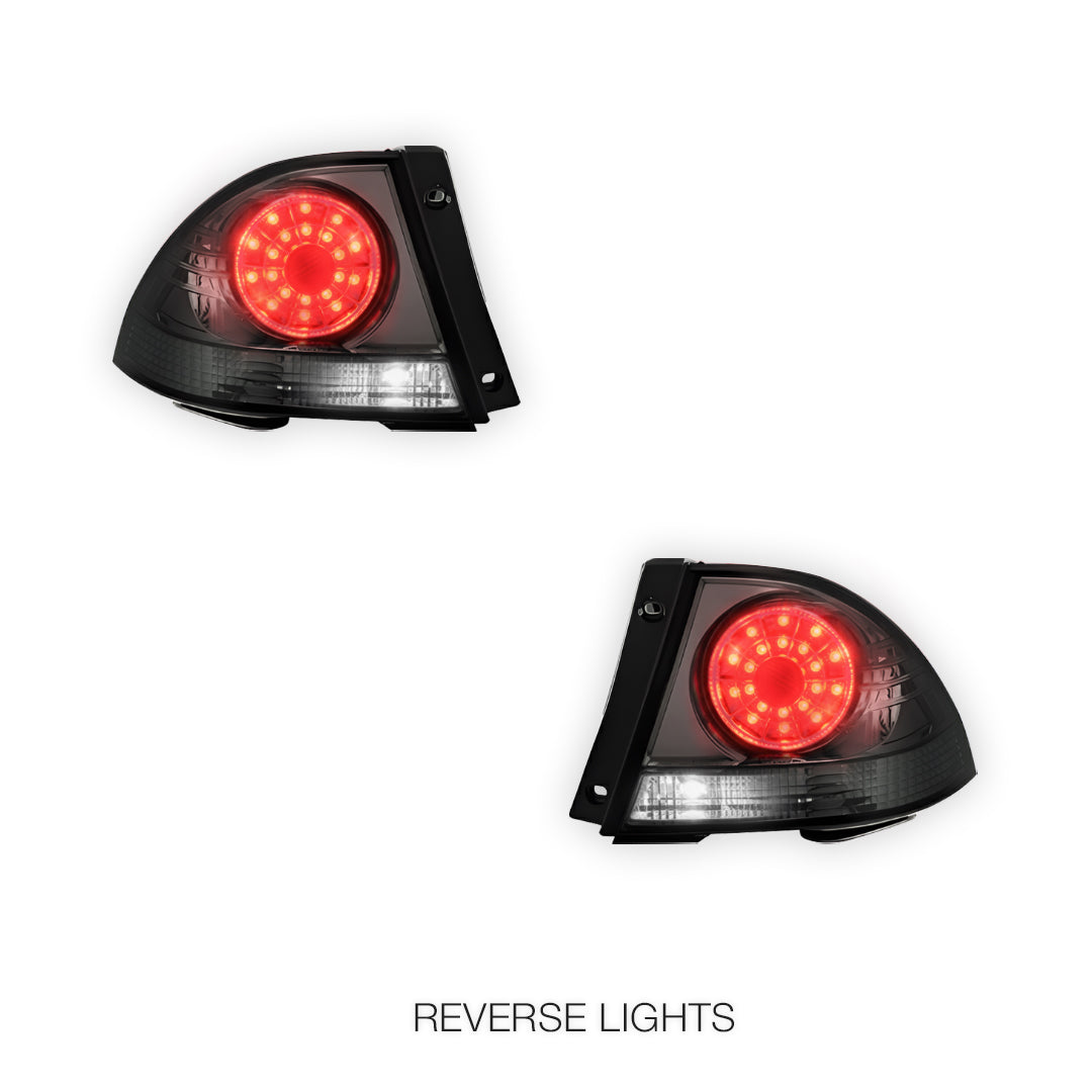 Lexus IS GXE10 (1998 - 2005) Smoked Black Altezza LED Tail Lights LH + RH