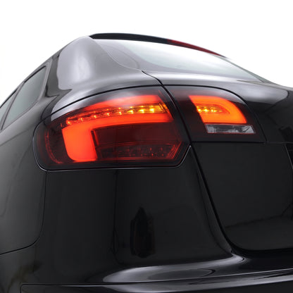 Audi A3 8P (2009 - 2013) Smoke Red Sequential Full 3D LED Stripe Tail Lights LH + RH installed close-up