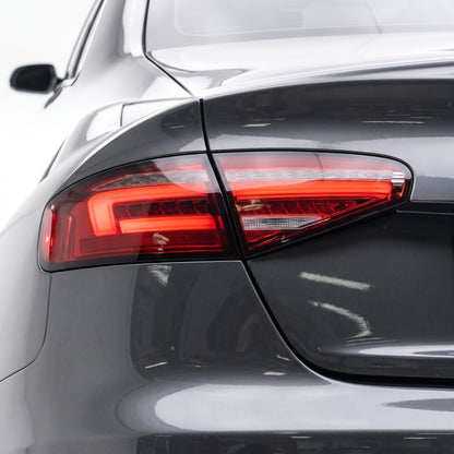 Audi A4 B8 (2012 - 2015) For models with stock LED tail lights only Clear Red Sequential 3D LED Stripe Tail Lights LH + RH installed close-up