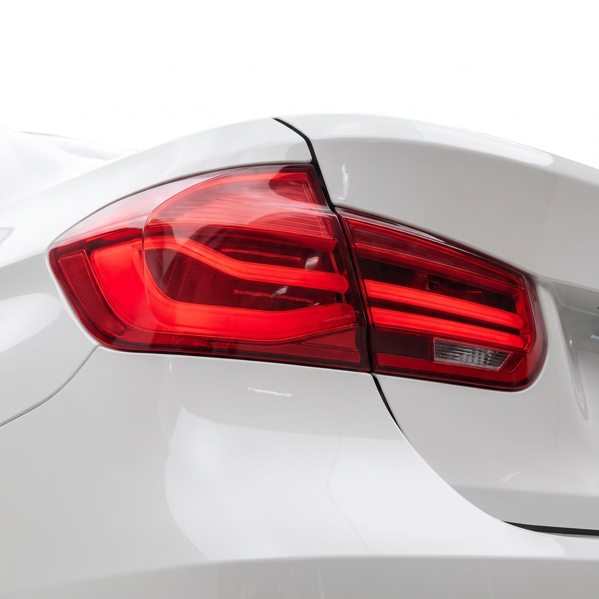 BMW 3-Series F30 / F80 / M3 (2012 - 2019) Sequential Red LED Tail Lights LH + RH installed close-up