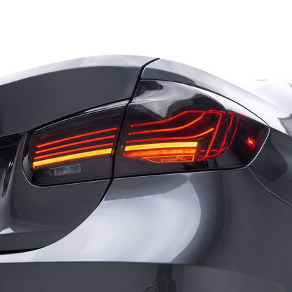 BMW 3-Series F30 / F80 / M3 (2013 - 2018) CSL Style Sequential Smoked LED Tail Lights LH + RH installed close-up