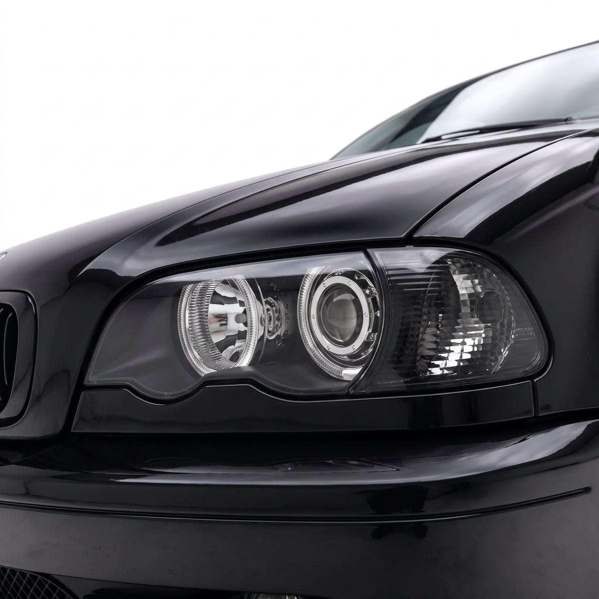 BMW 3 Series E46 Coupe (1999 - 2002) Black High Power LED Halo Angel Eyes Projector Headlights LH + RH installed close-up