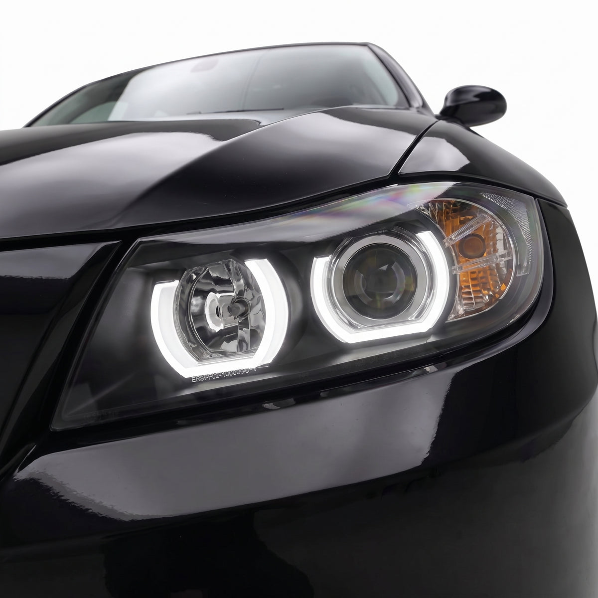 BMW 3 Series E90 / E91 (2005 - 2008) Black LED 3D Angel-Eyes Projector Headlights LH + RH installed close-up