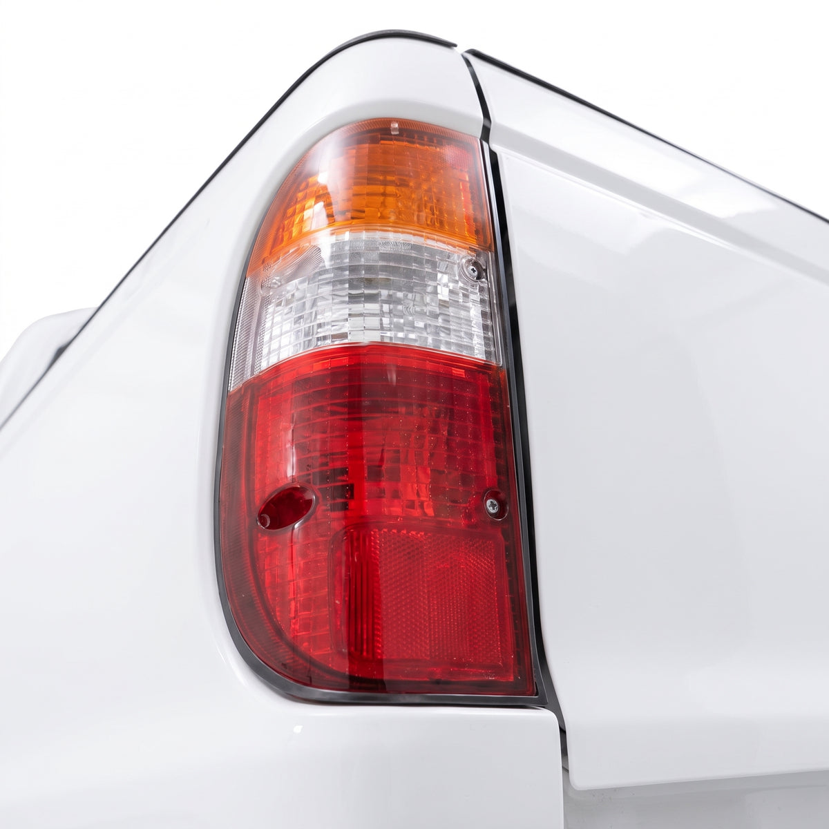 Ford Courier PG / PH (2002 - 2006) OEM Style Tail Lights LH + RH installed close-up