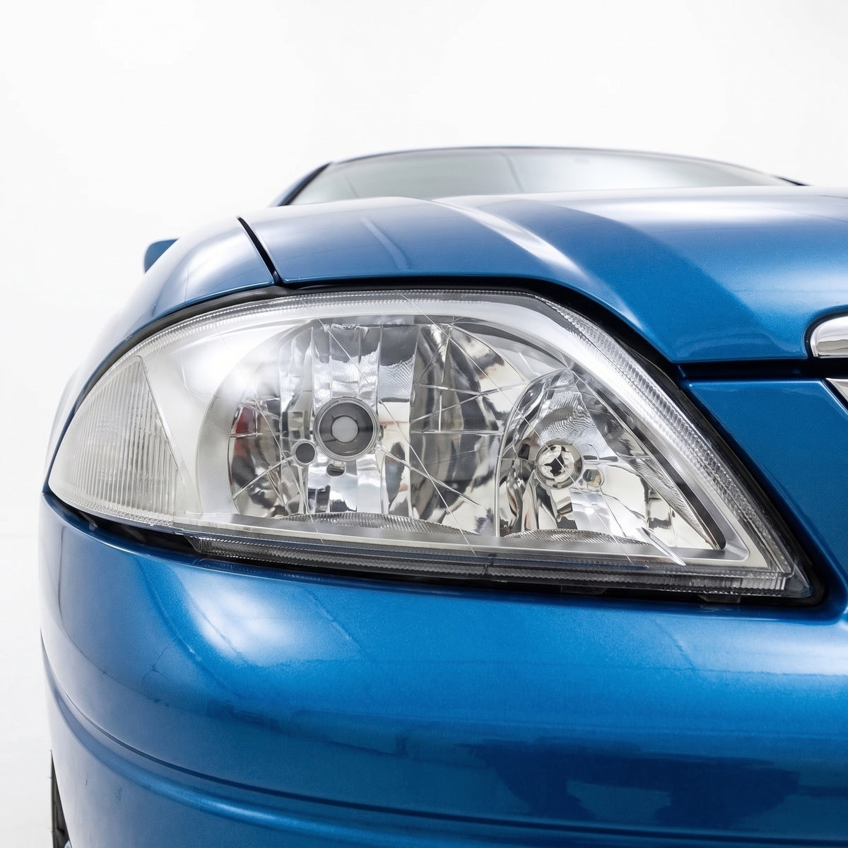 Ford Falcon AU Series 1 & 2 & 3 (1998 - 2002) Silver Grey Headlights LH + RH installed close-up