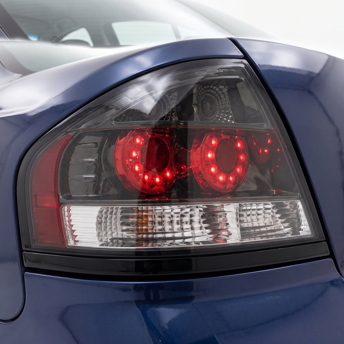 Ford Falcon BA / BF (2002 - 2007) Smoked LED Altezza Tail Lights LH + RH installed close-up