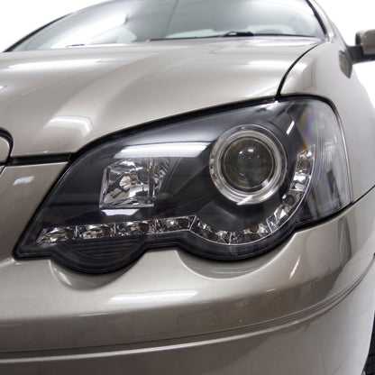 Ford Falcon BA / BF (2002 - 2008) LED DRL Projector Headlights LH + RH installed close-up