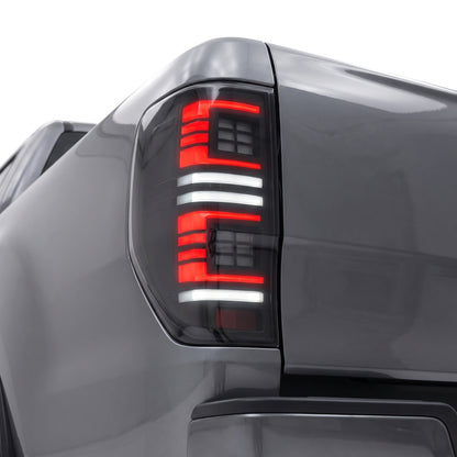 Ford Ranger PX MK1 MK2 MK3 (2011 - 2022) Smoked Block 3D Stripe Bars Sequential Tail Lights LH + RH installed close-up