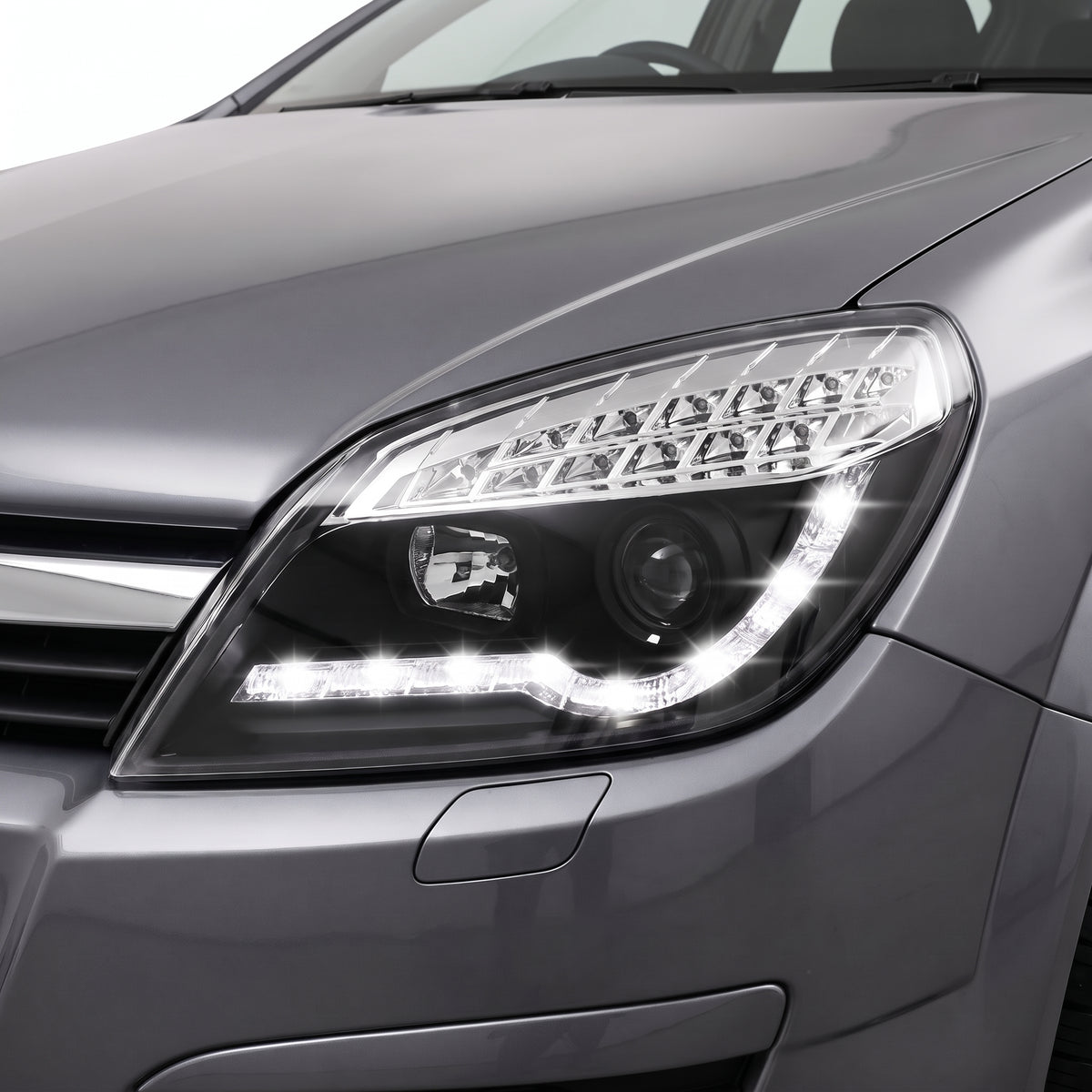 Holden Astra AH (2004 - 2012) LED DRL Projector Headlights LH + RH installed close-up