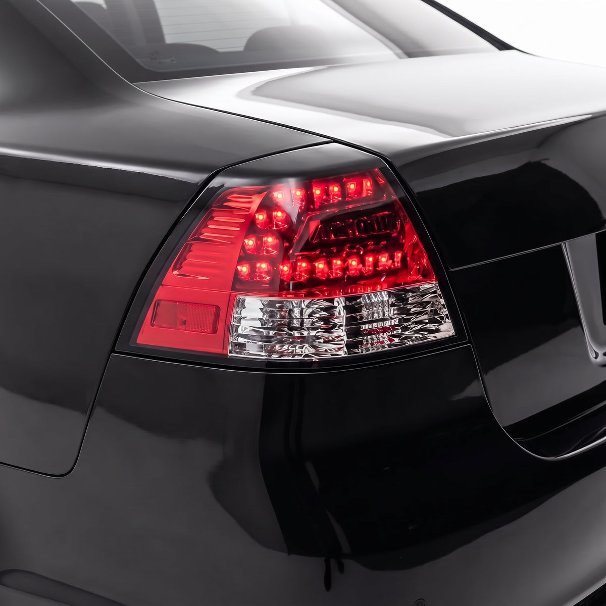 Holden Commodore VE Series 1 & 2 Sedan (2006 - 2013) Clear LED Tail Lights LH + RH installed close-up