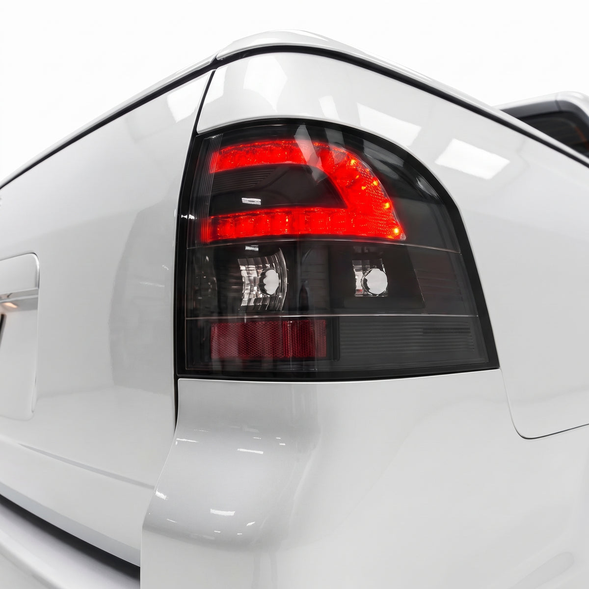 Holden Commodore VE UTE Series 1 & 2 (2007 - 2013) Black LED Tail Lights LH + RH installed close-up
