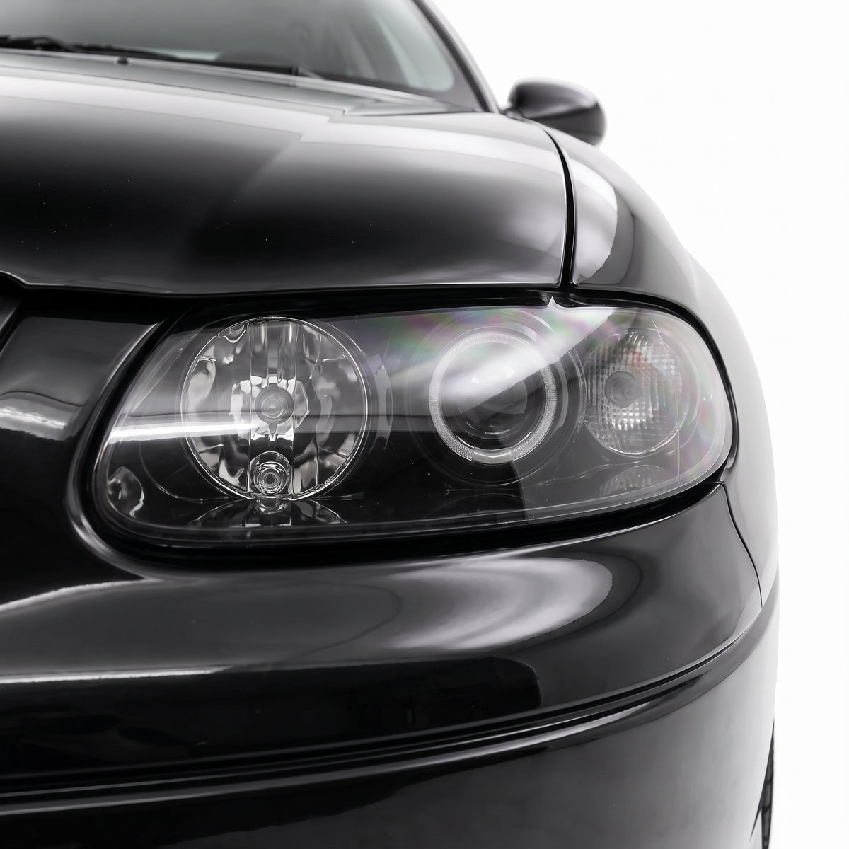 Holden Commodore VT (1997 - 2000) Black LED Halo Angel Eyes Altezza Headlights LH + RH installed close-up