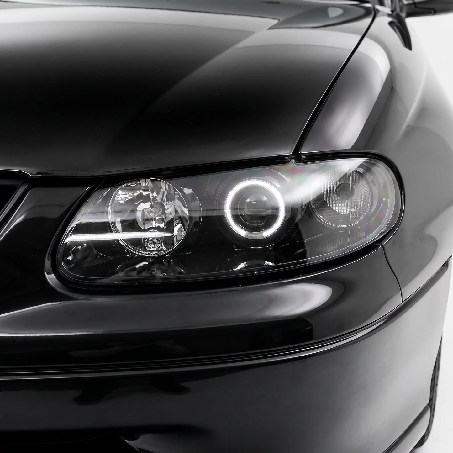 Holden Commodore VT (1997 - 2000) Black LED Halo Angel Eyes Altezza Headlights LH + RH