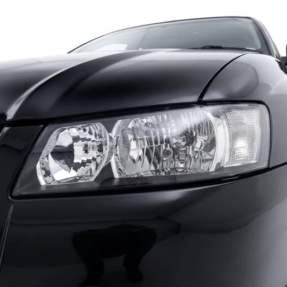 Holden Commodore VZ SV6 (2004 - 2007) Black OEM Style Headlights LH + RH installed close-up