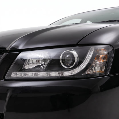 Holden Commodore VZ (2004 - 2007) Black DRL LED Projector Headlights LH + RH installed close-up