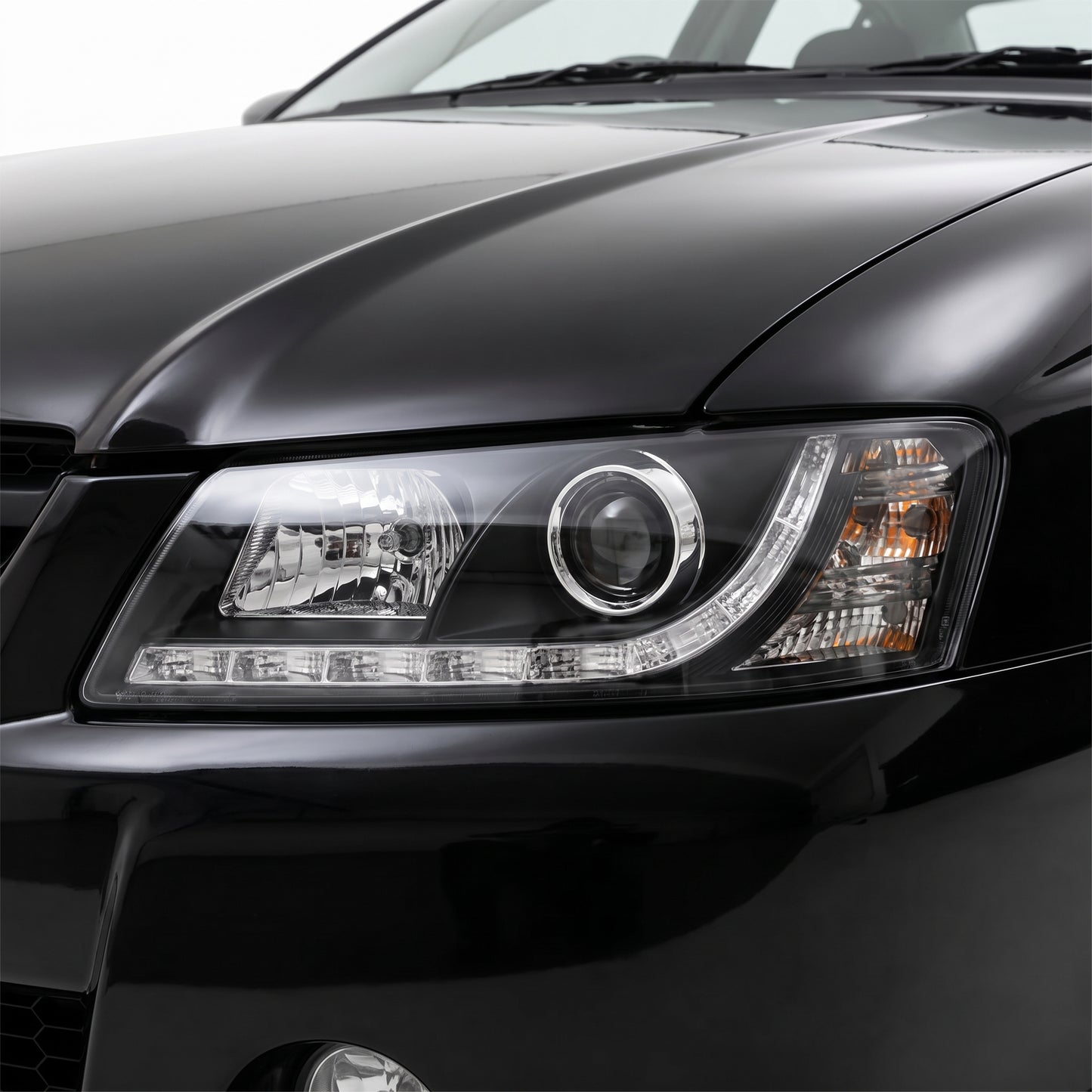 Holden Commodore VZ (2004 - 2007) Black DRL LED Projector Headlights LH + RH