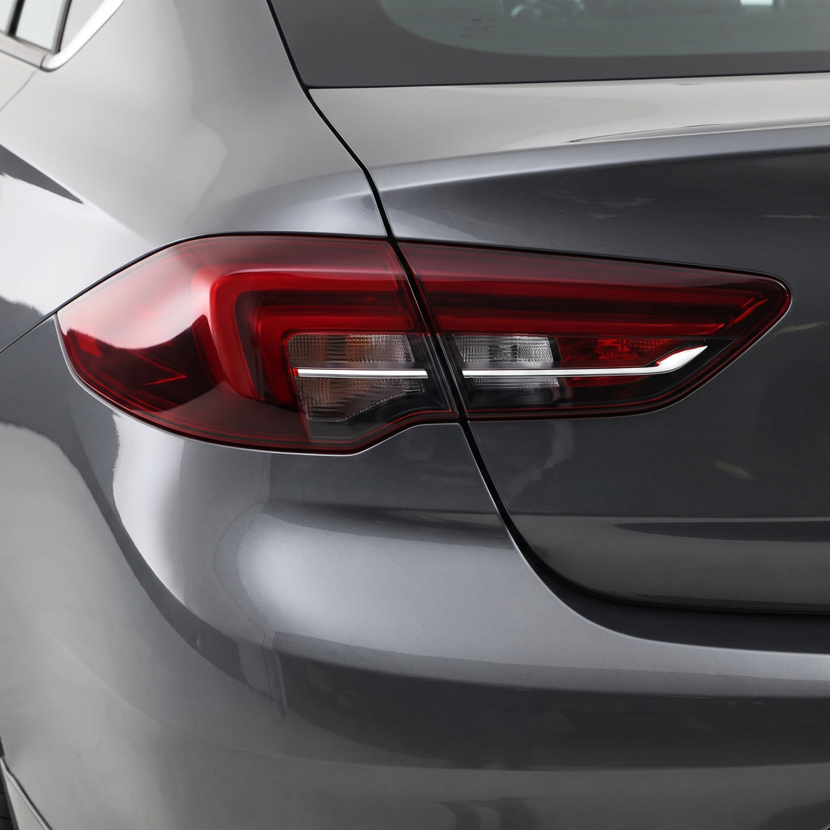 Holden Commodore ZB (2018 - 2020) Tinted Red Rear Garnish Tail Lights LH + RH installed