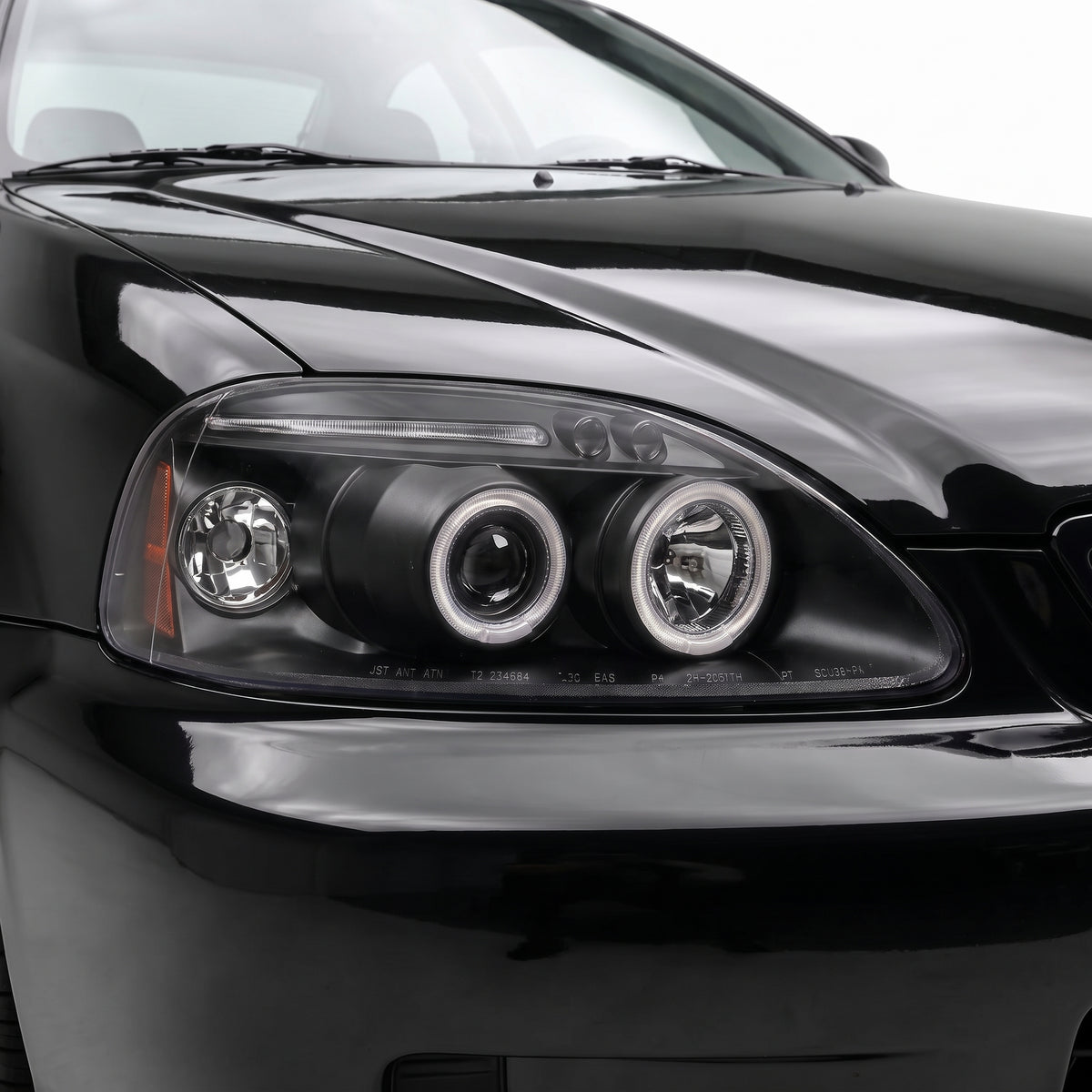 Honda Civic EK (1999 - 2000) Black LED Halo Angel Eyes Projector Headlights LH + RH installed close-up