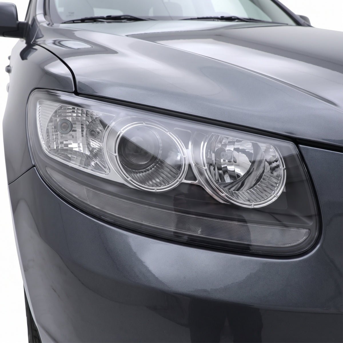 Hyundai Santa Fe CM (2005 - 2009) OEM Style Headlights LH + RH installed close-up