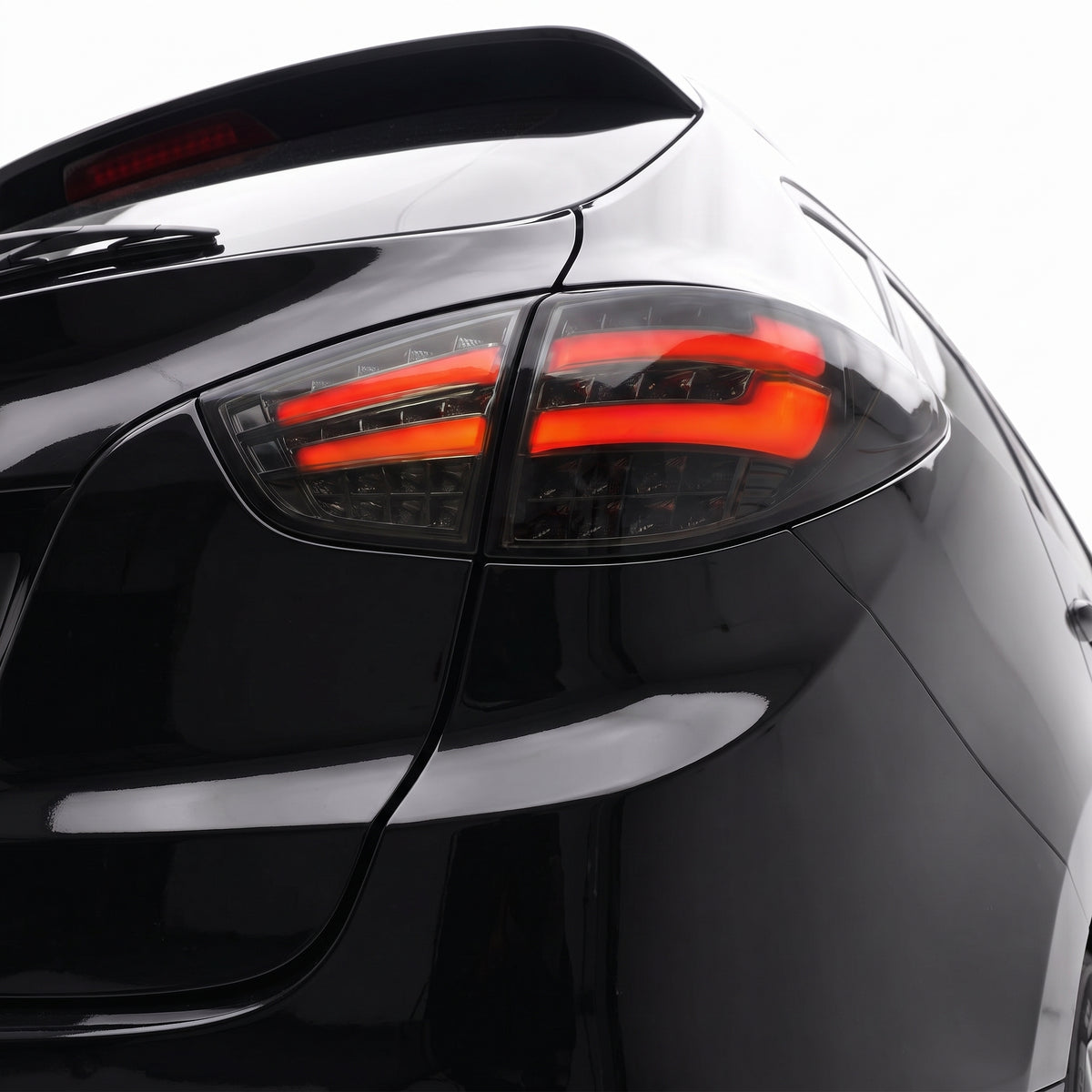 Hyundai Tucson JM / TL / TLE (2009 - 2015) Smoked Black Full LED Tail Lights LH + RH installed close-up