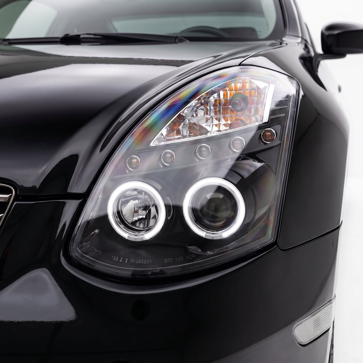 Infiniti G35 Coupe (2001 - 2007) Angel Eyes Projector Headlights LH + RH installed close-up