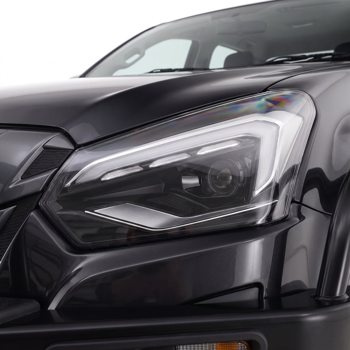 Isuzu D-MAX RT Ute (2017 - 2020) Black MY24 Update Style FULL LED Headlights LH + RH installed close-up
