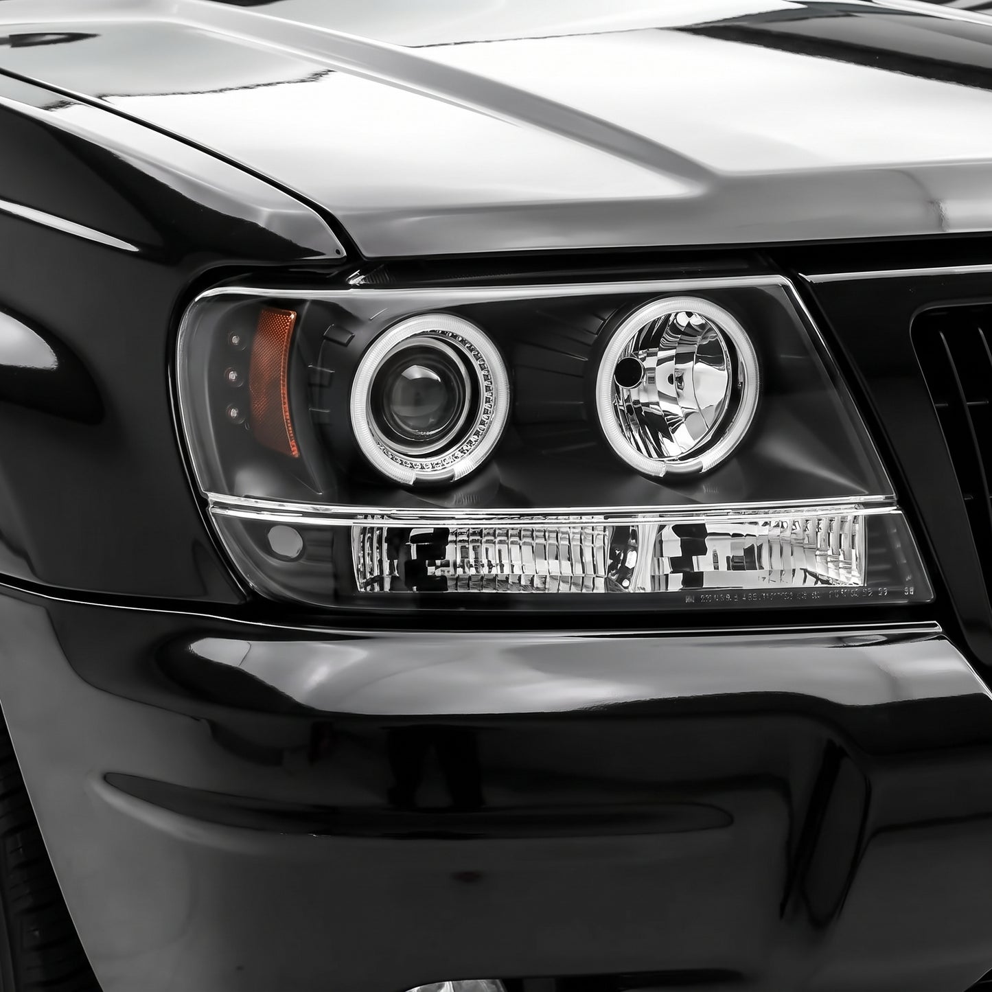 Jeep Grand Cherokee WJ (1999 - 2004) Black CCFL Angel Eyes Projector Headlights LH + RH