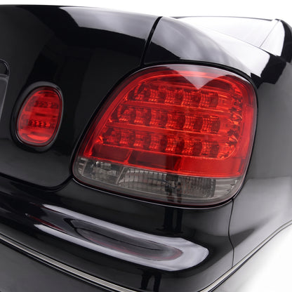 Lexus GS S160 (1998 - 2005) Smoked Red LED Tail Lights with Trunk Lights LH + RH installed close-up