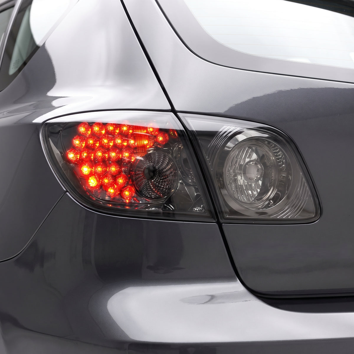 Mazda 3 BK (2003 - 2009) Smoked LED Tail Lights LH + RH installed close-up