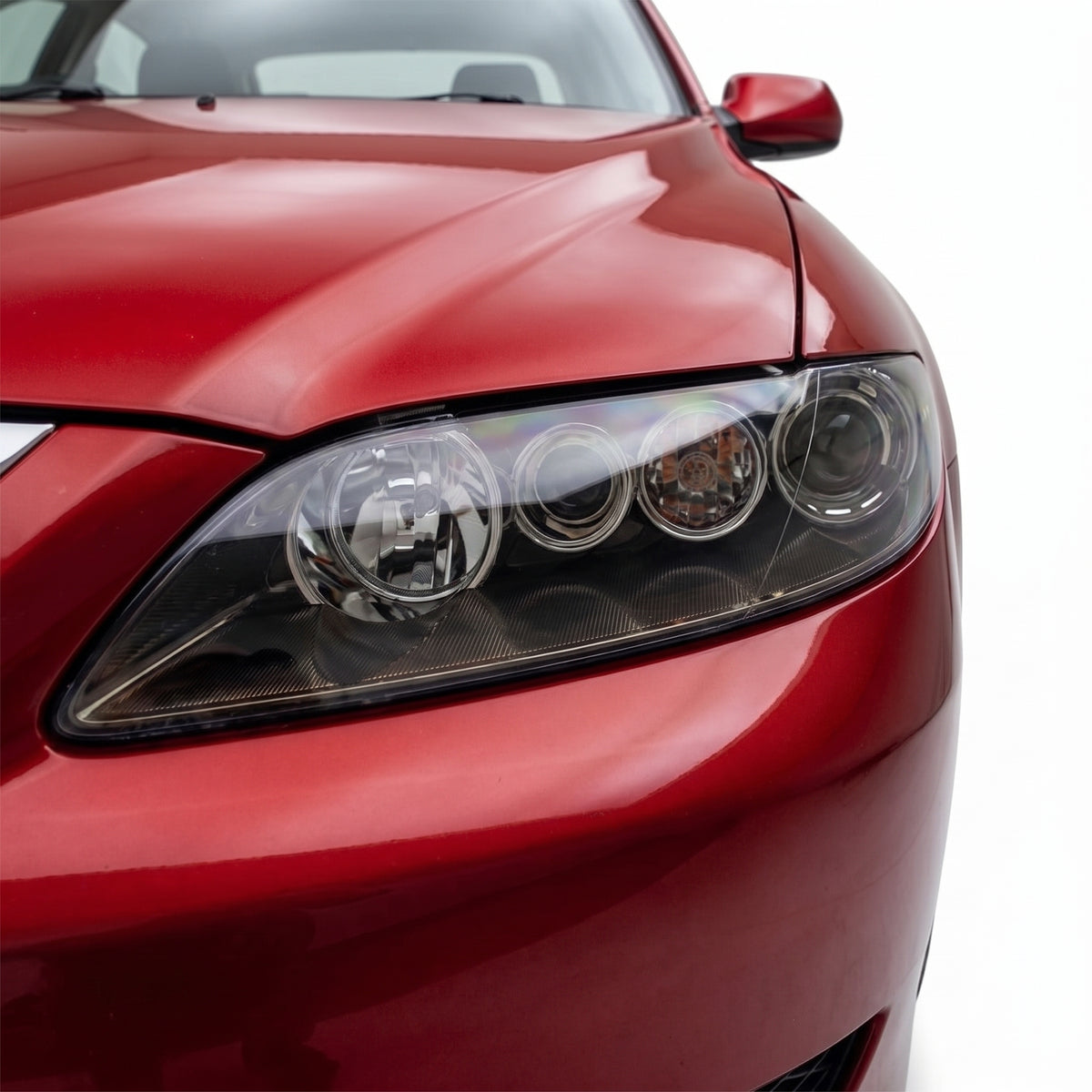 Mazda 6 GG GY Sedan / Hatch (2005 - 2008) Black OEM Style Headlights LH + RH installed close-up