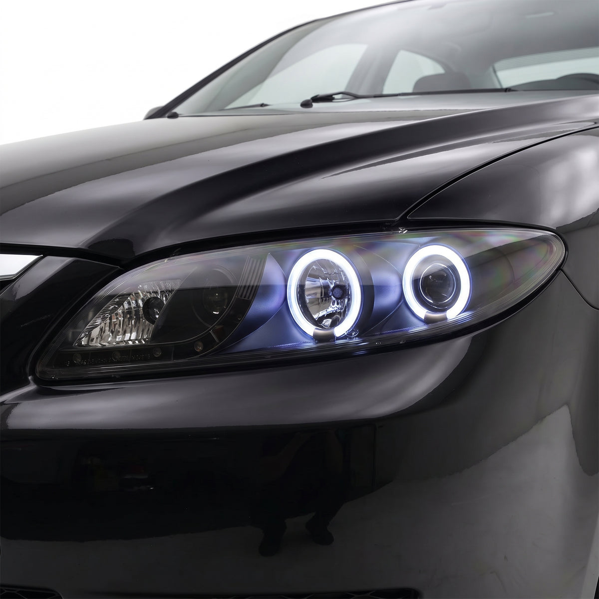Mazda 6 GG / GY (2002 - 2007) LED DRL CCFL Angel-Eyes Projector Headlights LH + RH installed close-up