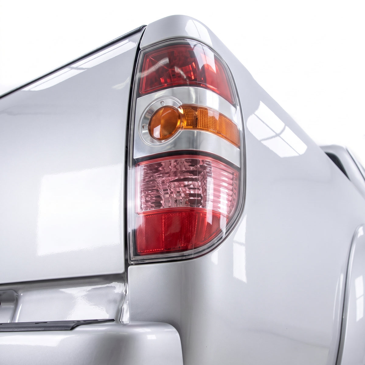 Mazda BT-50 UN (2006 - 2008) OEM Style Tail Lights LH + RH installed close-up