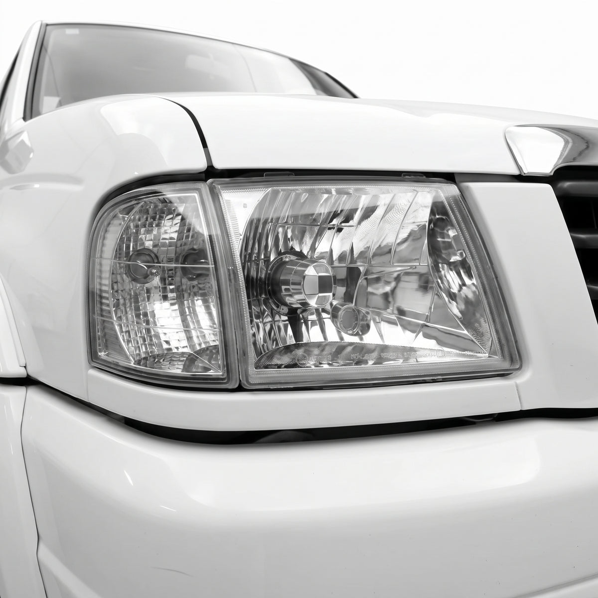 Mazda Bravo UN (2002 - 2006) OEM Style Headlights LH + RH installed close-up