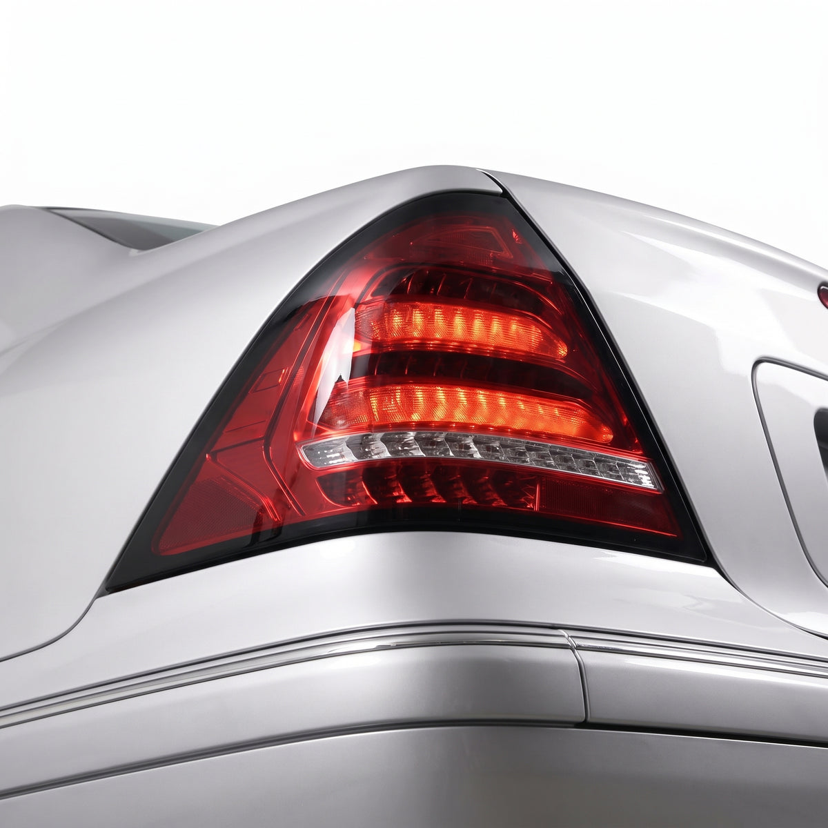 Mercedes-Benz C-Class W203 (2005 - 2007) Clear Red Sequential 3D LED Stripe Bar Tail Lights LH + RH installed close-up