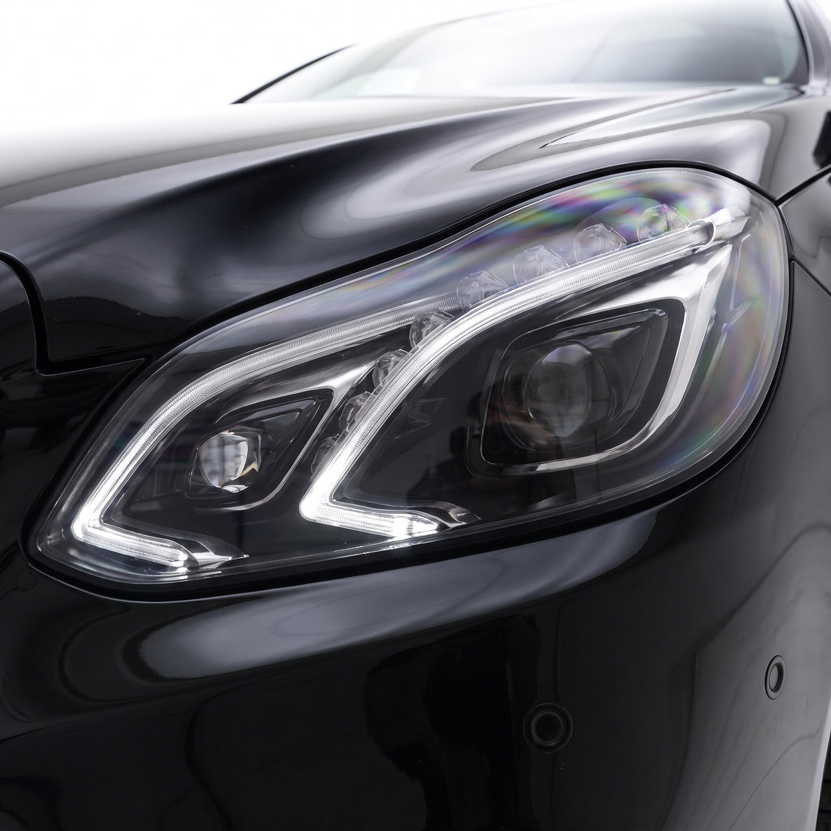Mercedes-Benz E-Class W212 (2013 - 2016) FULL LED AMG E63 Style Projector Headlights LH + RH installed close-up
