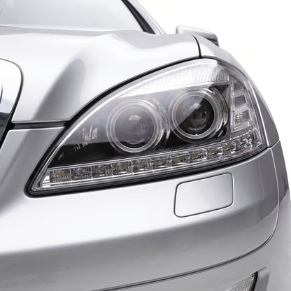 Mercedes-Benz S-Class W221 (2006 - 2009) S65 AMG Style DRL LED Projector Headlights with LED Indicators LH + RH installed close-up