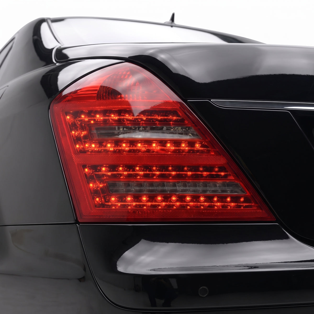 Mercedes-Benz S-Class W221 (2006 - 2009) Smoked Red LED Tail Lights LH + RH installed close-up