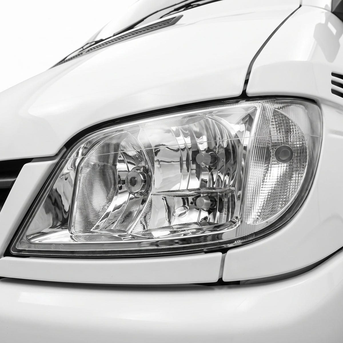 Mercedes-Benz Sprinter Van (2003 - 2006) Crystal Clear OEM Style Headlights LH + RH installed close-up