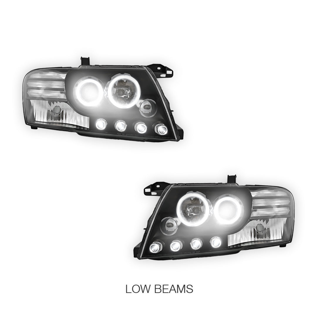 Mitsubishi Pajero NM / NP (2000 - 2006) Black High Power LED Angel Eyes Projector Headlights LH + RH