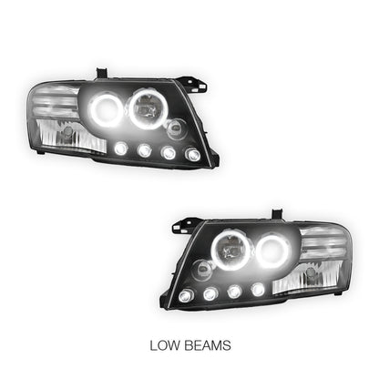 Mitsubishi Pajero NM / NP (2000 - 2006) Black High Power LED Angel Eyes Projector Headlights LH + RH