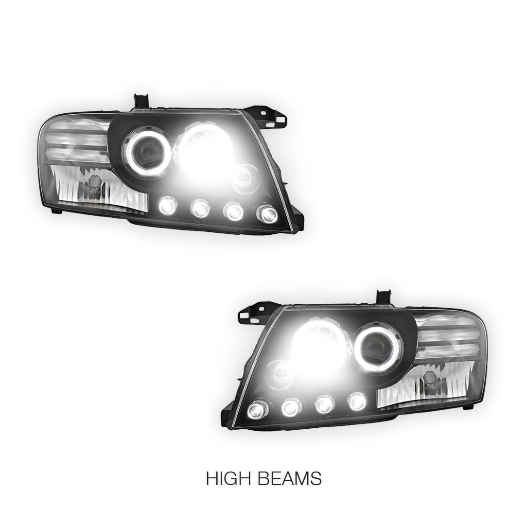 Mitsubishi Pajero NM / NP (2000 - 2006) Black High Power LED Angel Eyes Projector Headlights LH + RH