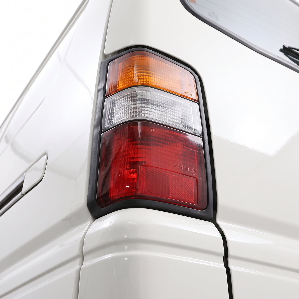 Mitsubishi L300 Express SJ (2000 - 2008) OEM Style Tail Lights LH + RH installed close-up