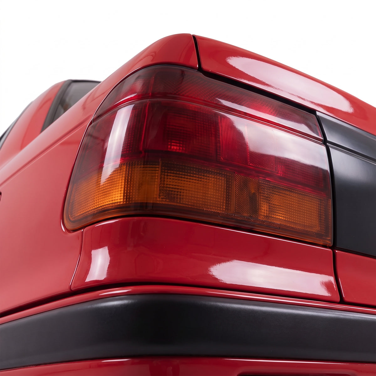 Mitsubishi Lancer CC (1990 - 1992) Red / Black OEM Style Tail Lights LH + RH installed close-up