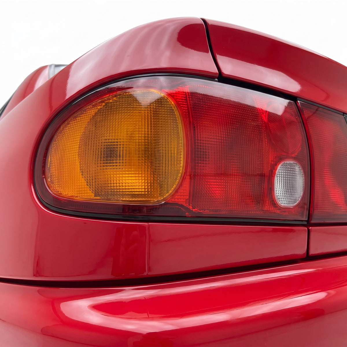 Mitsubishi Lancer CC (1992 - 1996) Red OEM Style Tail Lights LH + RH installed close-up
