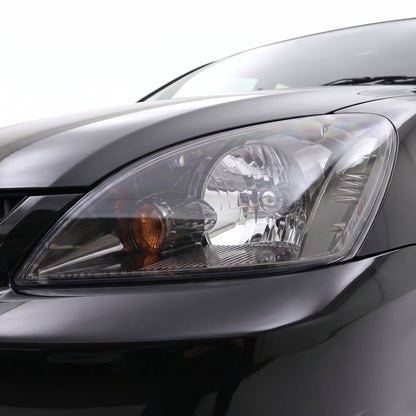 Mitsubishi Lancer CH (2003 - 2007) Black Headlights LH + RH installed close-up
