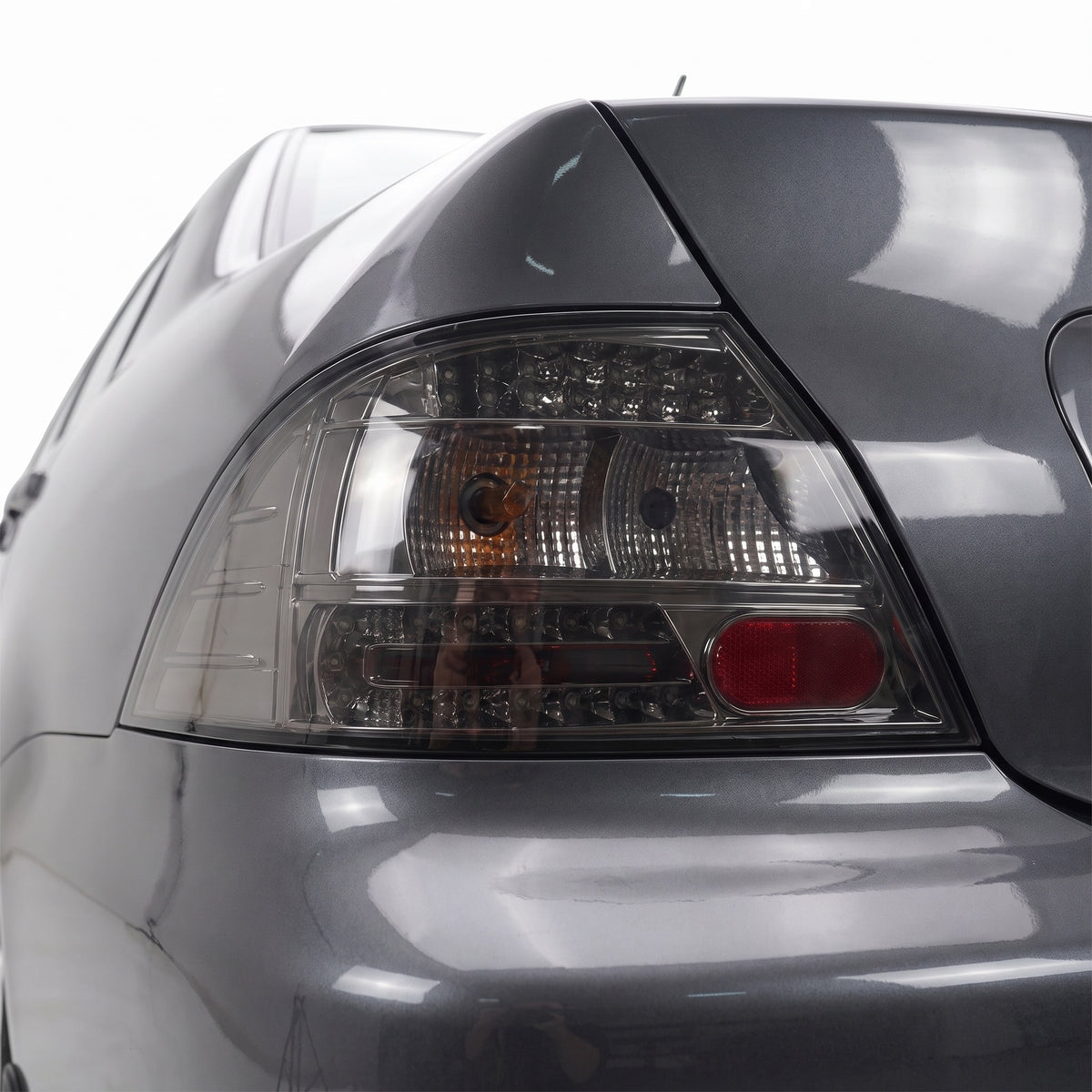 Mitsubishi Lancer CH (2003 - 2007) Full Smoked LED Tail Lights LH + RH installed close-up