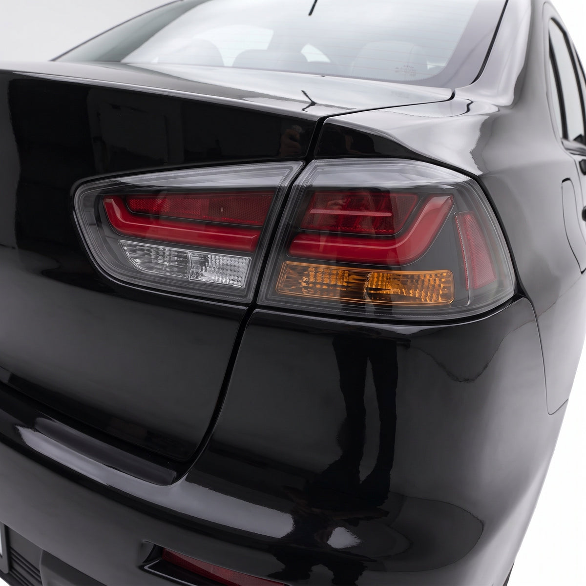 Mitsubishi Lancer Evo X / CJ / CF (2008 - 2018) Smoked Halo Sequential Tail Lights LH + RH installed close-up