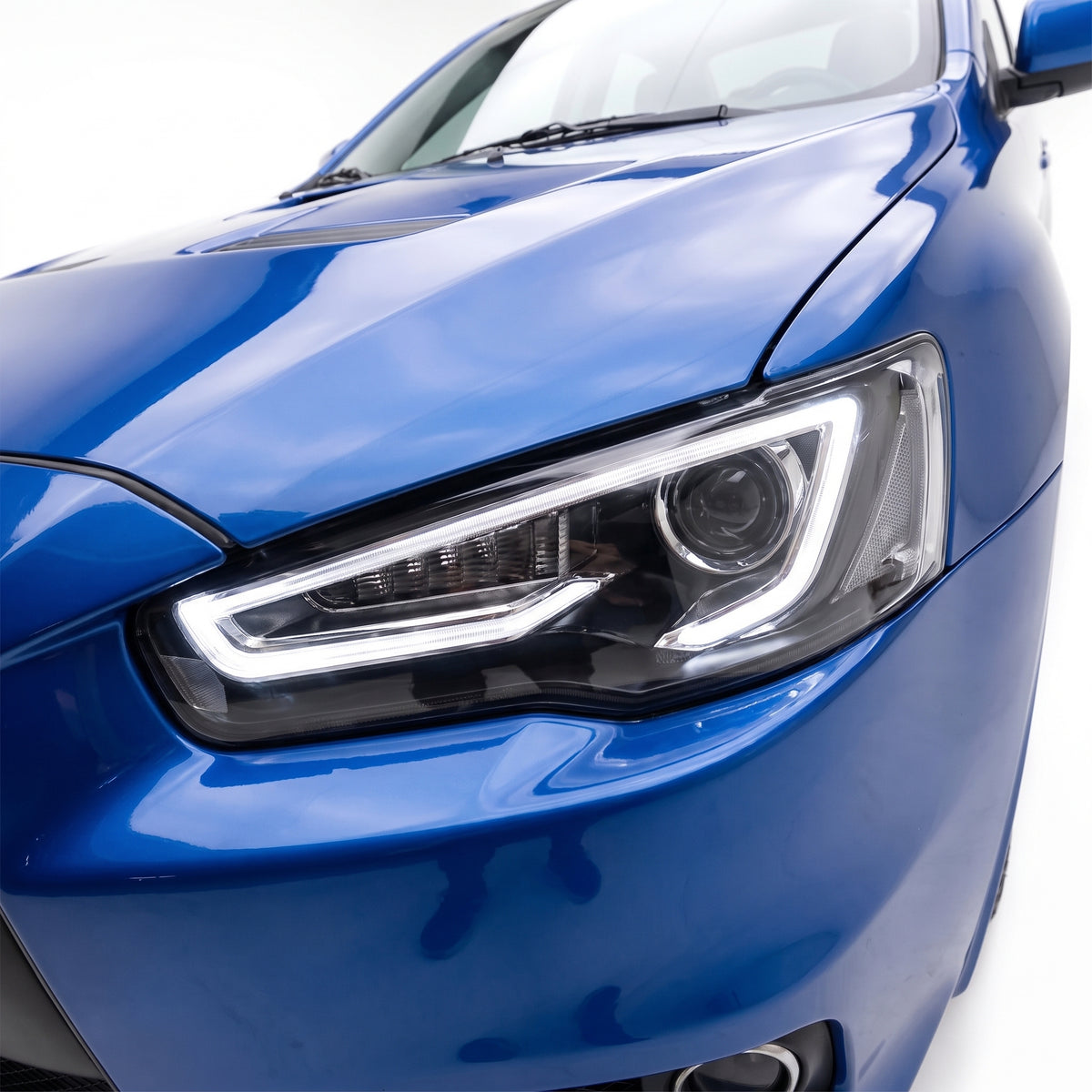 Mitsubishi Lancer Evolution X CF CJ (2007 - 2017) LED DRL Headlights LH + RH installed close-up