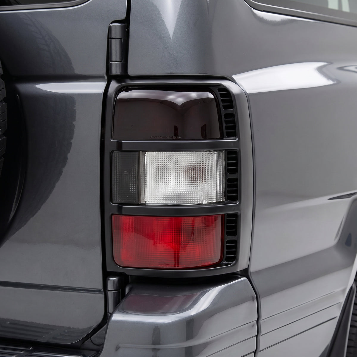 Mitsubishi Pajero NH / NJ / NK (1991 - 1997) Clear and Tinted Red Halogen Tail Lights LH + RH installed